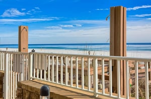 The outdoor showers on the boardwalk at Romar Place