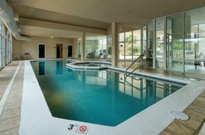 The indoor swimming pool and hot tub at Harbor Cove in Orange Beach Alabama