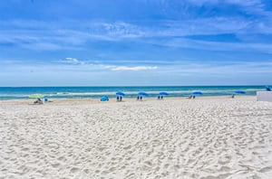 The pristine white beaches next to the ocean in Orange Beach Alabama