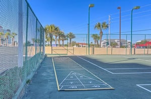 The outdoor shuffleboard courts at Phoenix I in Orange Beach Alabama