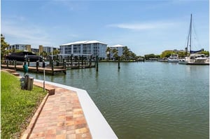 Relax as you walk along the harbor at Palm Harbor Condos in Fort Myers Beach FL