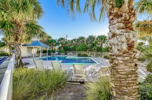 The outdoor pool and sundeck at Gulf Island Condos