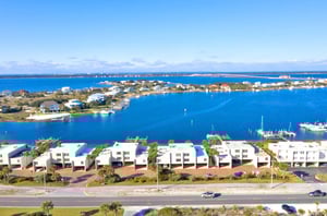 Treehouse Townhomes are nestled between Little Sabine Bay and the Gulf of Mexico