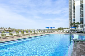 A St Martin Beachwalk Villas beachside pool with lots of loungers