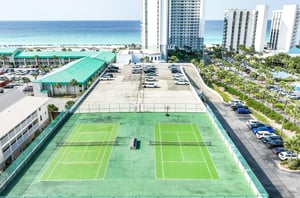 The community has rooftop tennis courts for guests