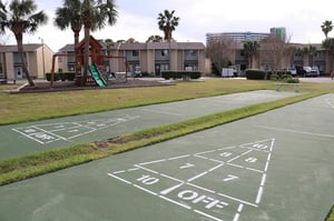 Enjoy a game of shuffleboard with the family at Gulf Highlands Panama City Beach Florida