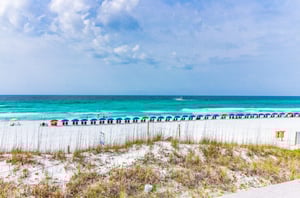 Miramar Beach Villas beach chairs and umbrellas