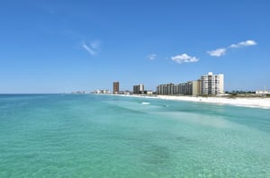 aerial view of Gulf Shores condo rentals along the shoreline of the Gulf of Mexico
