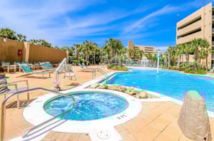 The outdoor hot tub and swimming pool at Emerald Beach Resort in Panama City Beach Florida
