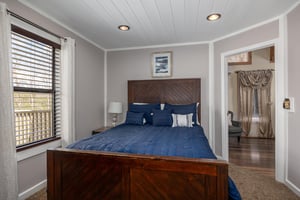 Bedroom with Nightstand at Hoop Dreams Lodge