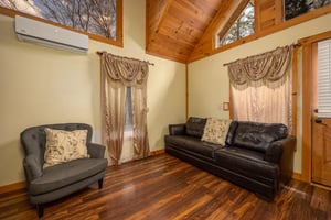 Sitting area with Couch and accent chair at Hoop Dreams Lodge
