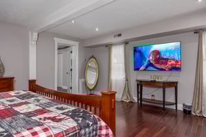 Master bedroom Flat Screen Tv at Hoop Dreams Lodge