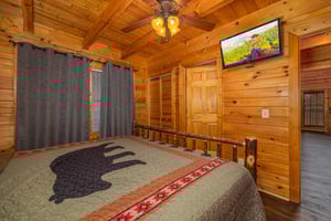 Flat screen in the bedroom at Eagles Nest, a 2 bedroom cabin rental located in sevierville