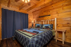 Bedroom with Bear Bedding at Eagles Nest, a 2 bedroom cabin rental located in sevierville