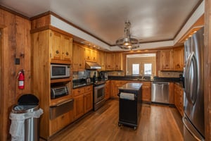 Kitchen with stainless appliances at Best View Ever A 5 bedroom cabin rental in Pigeon Forge