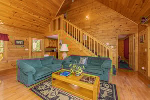 Sofa, loveseat, and coffee table at Cubs Crossing, a 3 bedroom cabin rental located in Gatlinburg