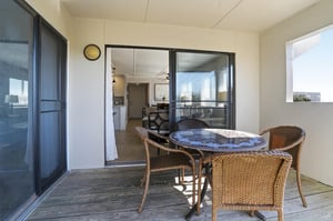 This covered balcony connects directly to the living space, creating an easy indooroutdoor flow for meals and time outside.