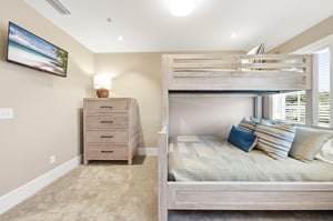 A closer angle makes the threeperson bunk arrangement easy to understand before arrival.