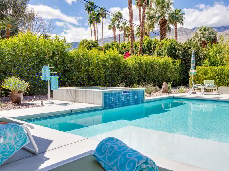 Integrated pool and spa