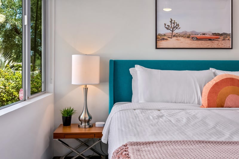 Nightstand with plant and lamp