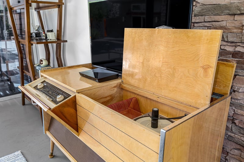 Turn up the timeless melodies on vintage stereo console