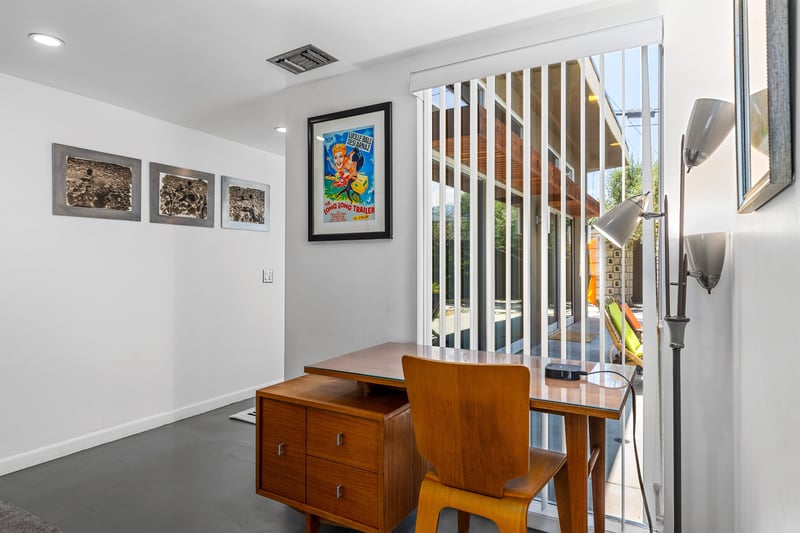 Functional hallway desk with backyard views