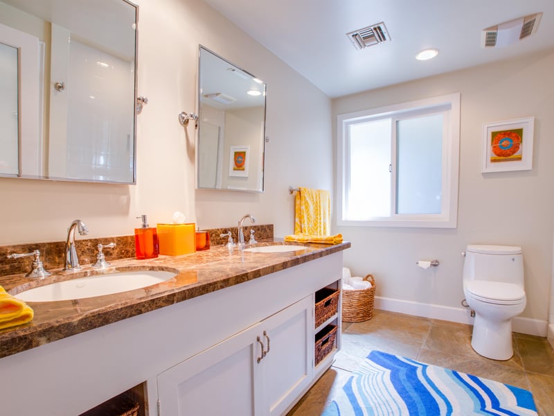 Spacious bathrooms with modern fixtures