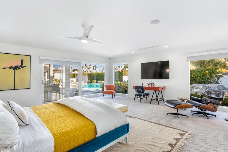 Spacious Primary Suite with direct access to the pool