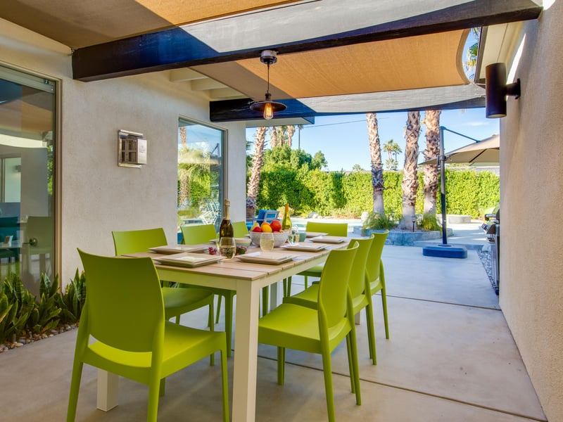 Outdoor dining area seats up to 8 guests