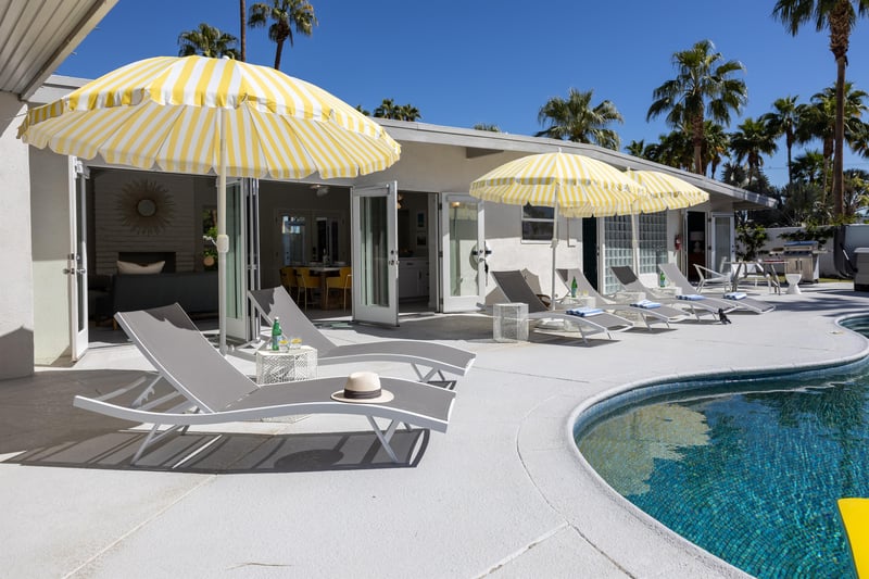 Stylish yellow pool umbrellas