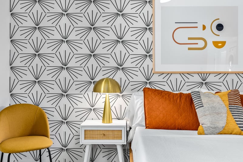 Gold accents adorn this guest bedroom