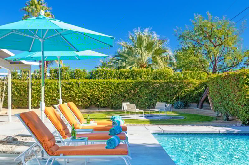 Enjoy a cocktail while relaxing poolside