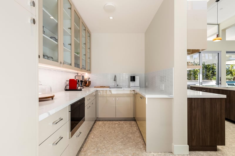 Butlers pantry behind the kitchen with all of the coffee