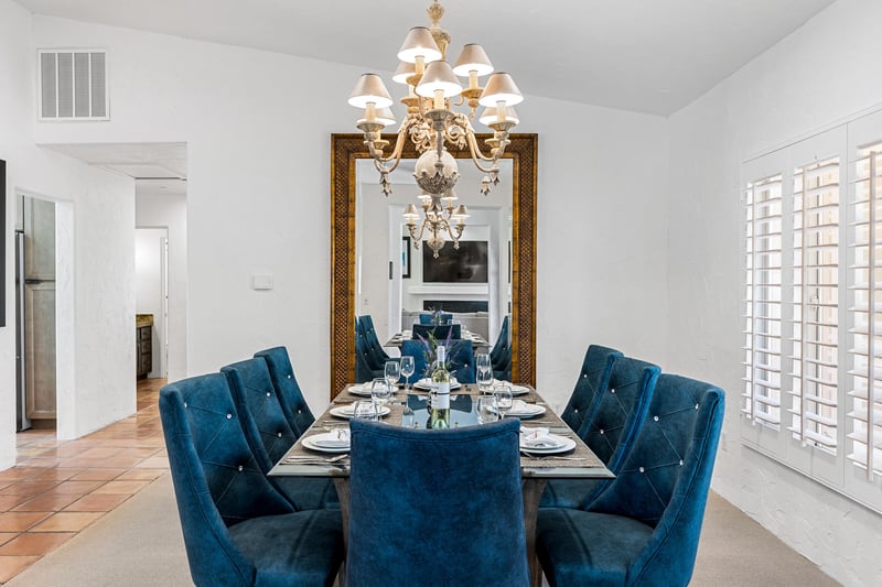 Luxurious blue chairs at this dining table