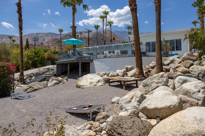 Play a game of cornhole