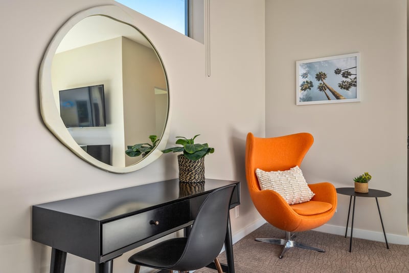 Primary bedroom desk and sitting area