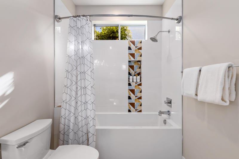Guest bathroom with bathtub