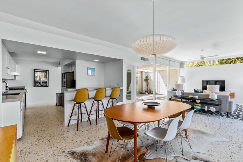 Open concept dining, kitchen, and living areas