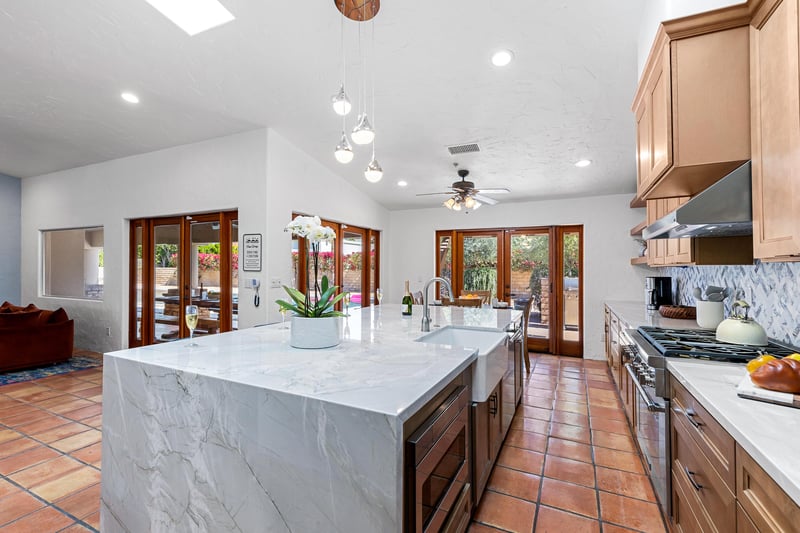 Huge chefs kitchen with marble island