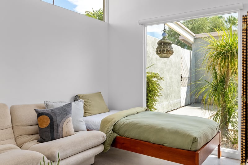 Guest bedroom with Vladimir Kagan sectional