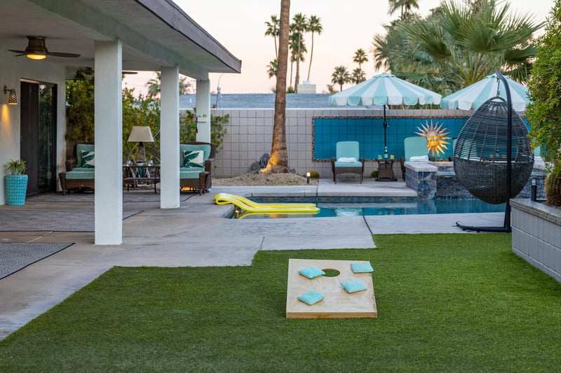 Play a game of cornhole