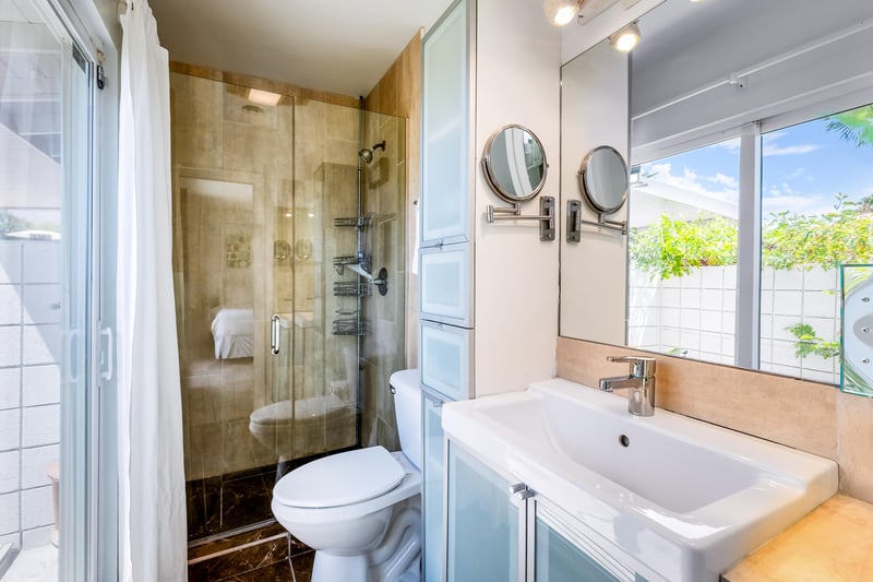 Primary bedroom with access to the Pool Deck