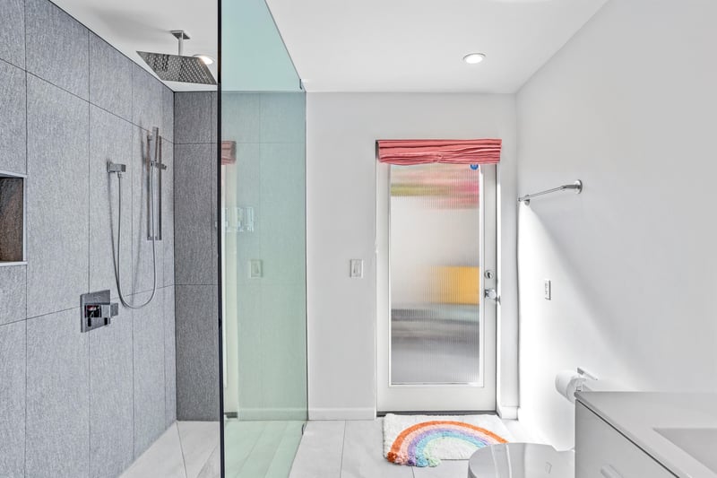 Casita bathroom with outdoor access to cute private patio