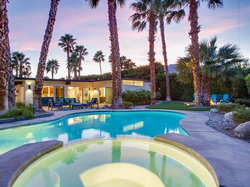 Have a soak in the integrated waterfall spa