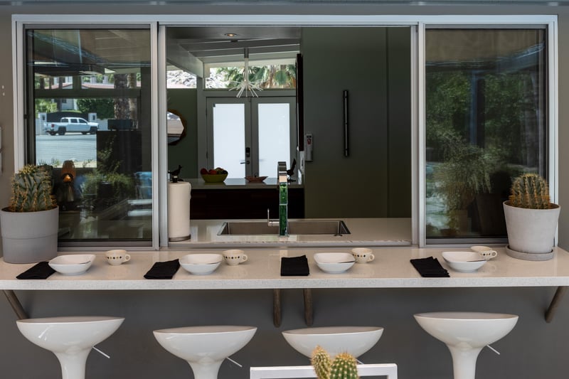 Pass through outdoor dining with barstools