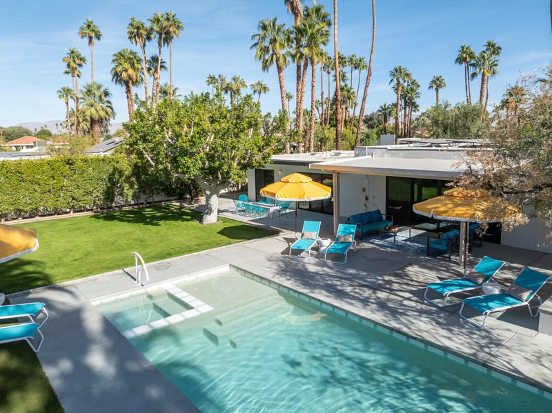 Surrounded by Palm Trees and amazing landscaping