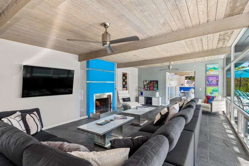 Midcentury modern designed living room with flat screen TV