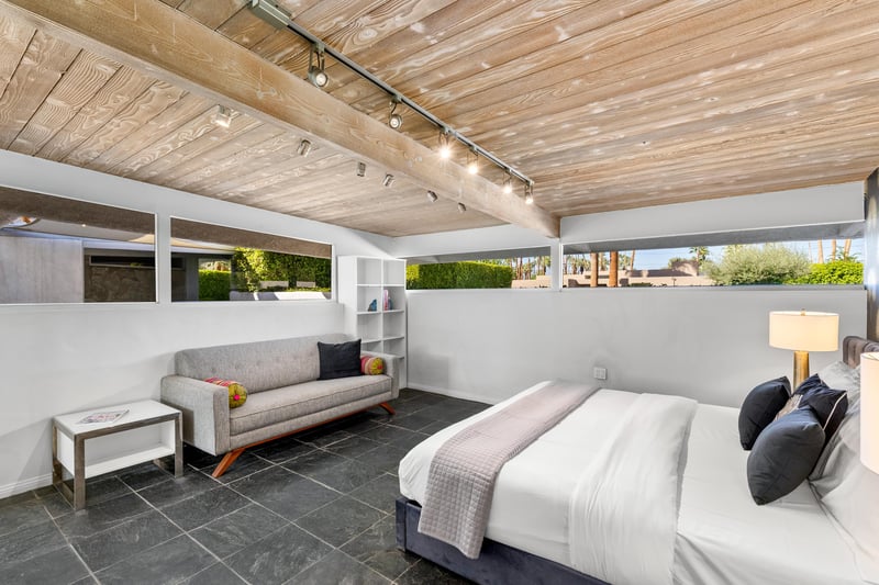 Guest bedroom with comfy lounge sofa