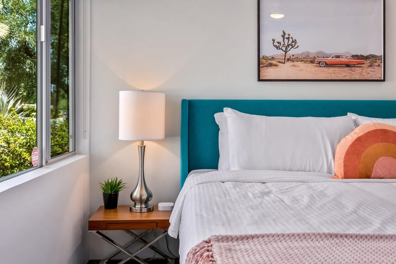 Nightstand with plant and lamp