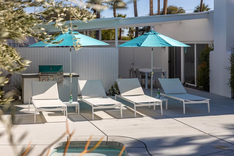 Shaded pool lounging chairs